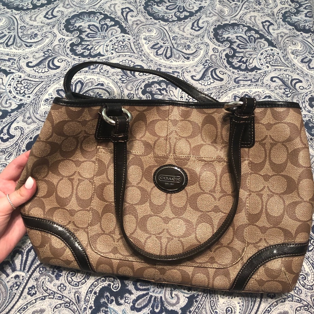 Brown Coach logo handbag